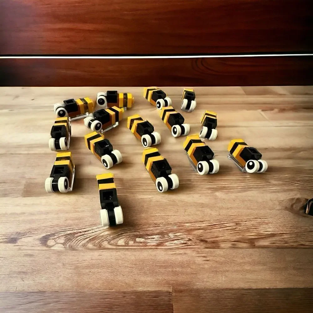 Lego Bee’s 15 total genuine Lego parts. Great to add to Lego flower sets.